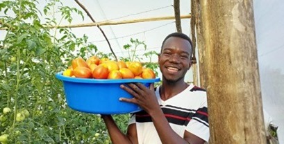 Staff Holding Produce